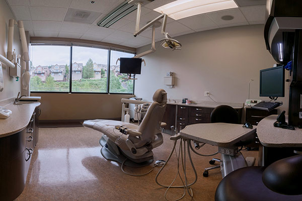 Dental chair in exam room at Fusion Dental Specialists in Happy Valley, OR.