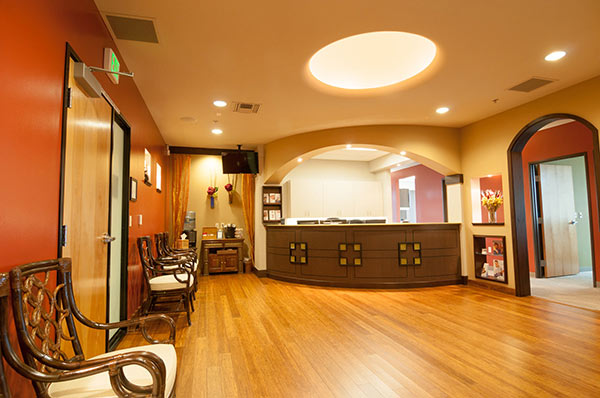 Waiting area and front desk at Fusion Dental Specialists in Happy Valley, OR