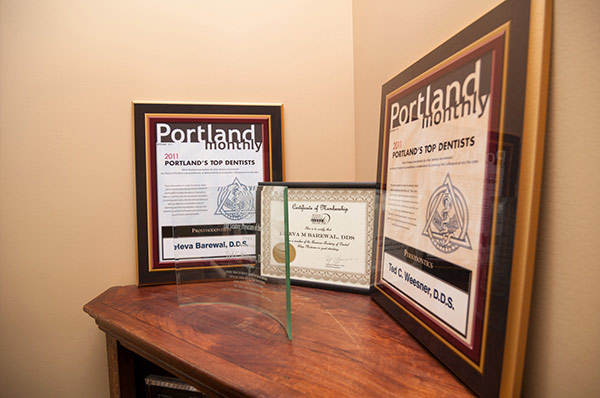 Framed Portland Monthly Top Dentists on desk at Fusion Dental Specialists in Happy Valley, OR.