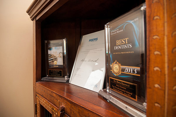 Framed Best Dentists awards on shelf at Fusion Dental Specialists in Happy Valley, OR.